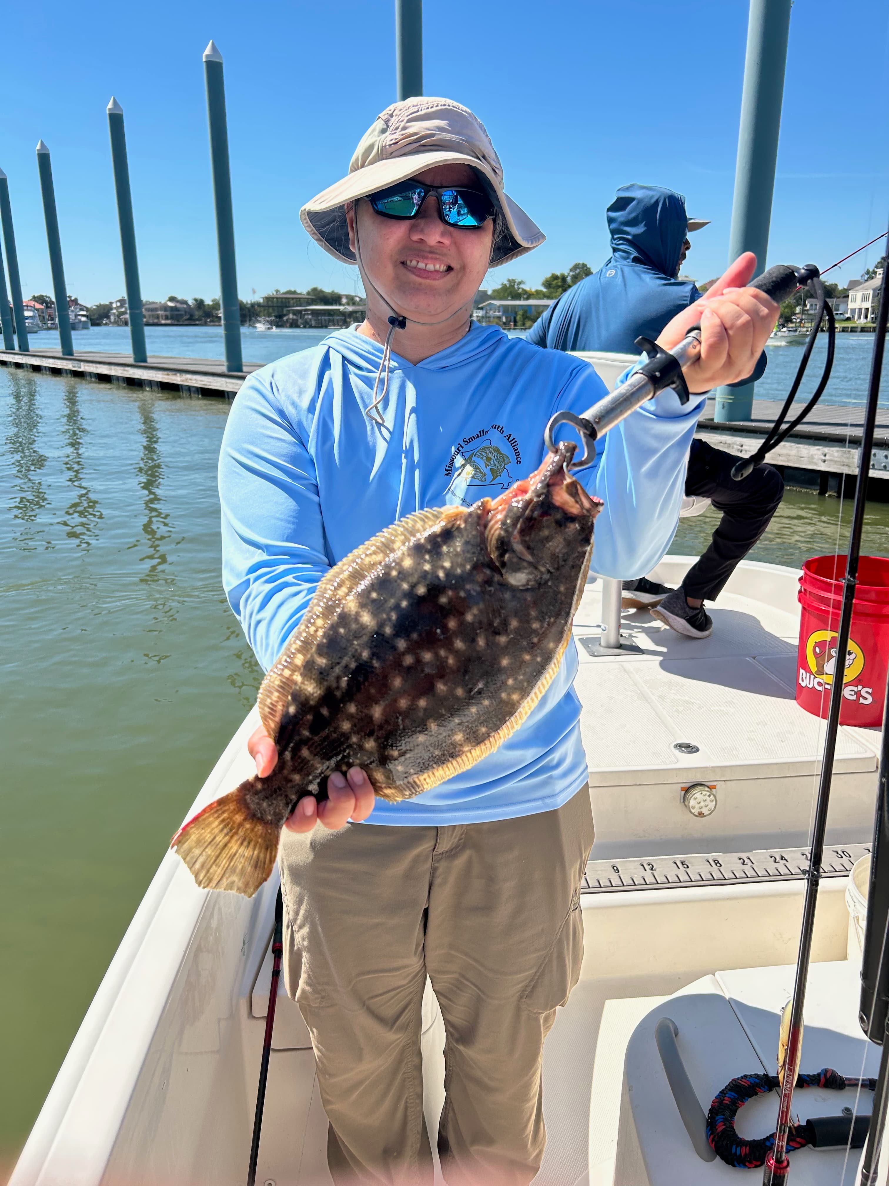 Woman with her Flounder Catch