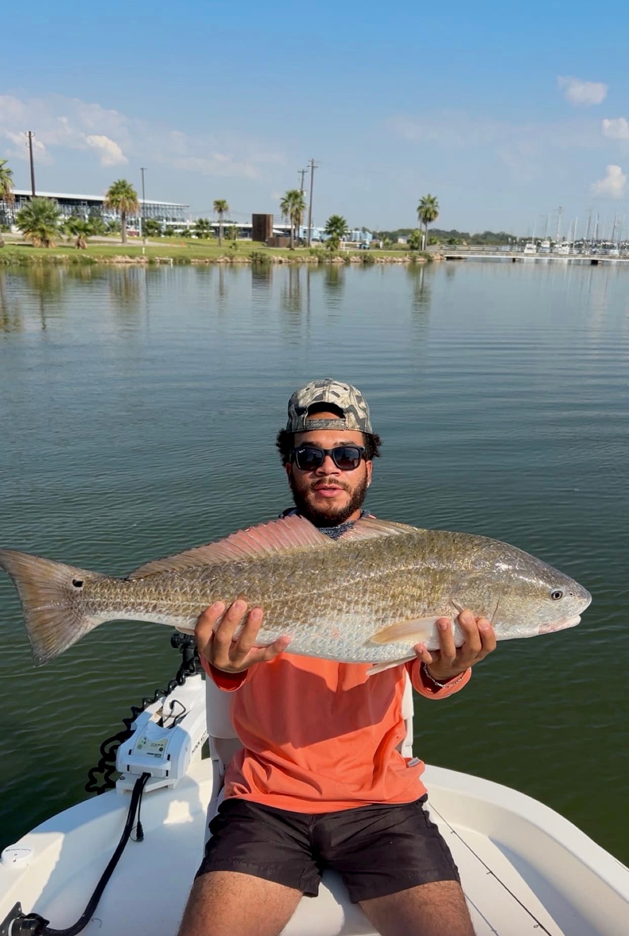 Harrison holding a redfish