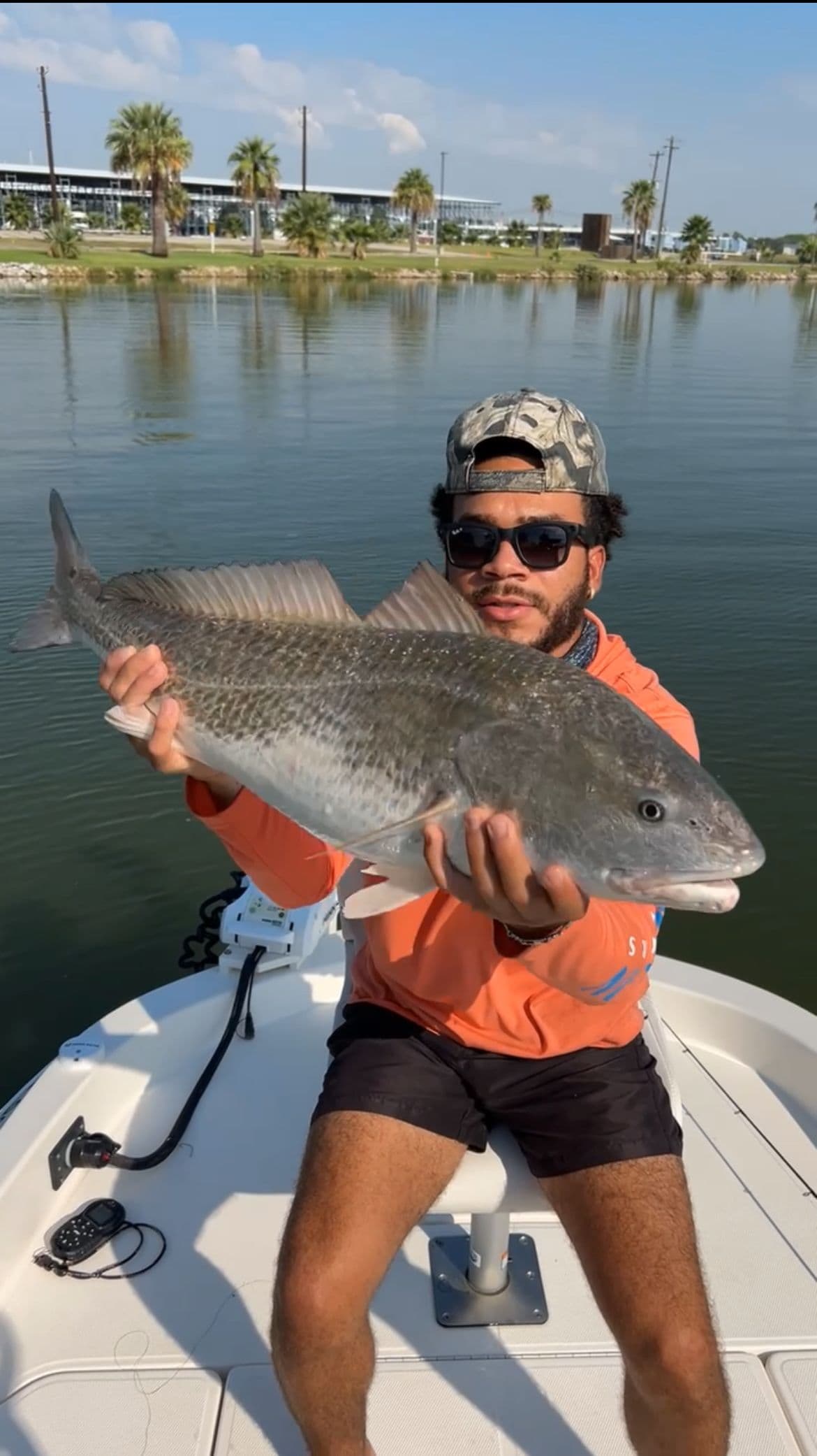 Harrison Holding a fish
