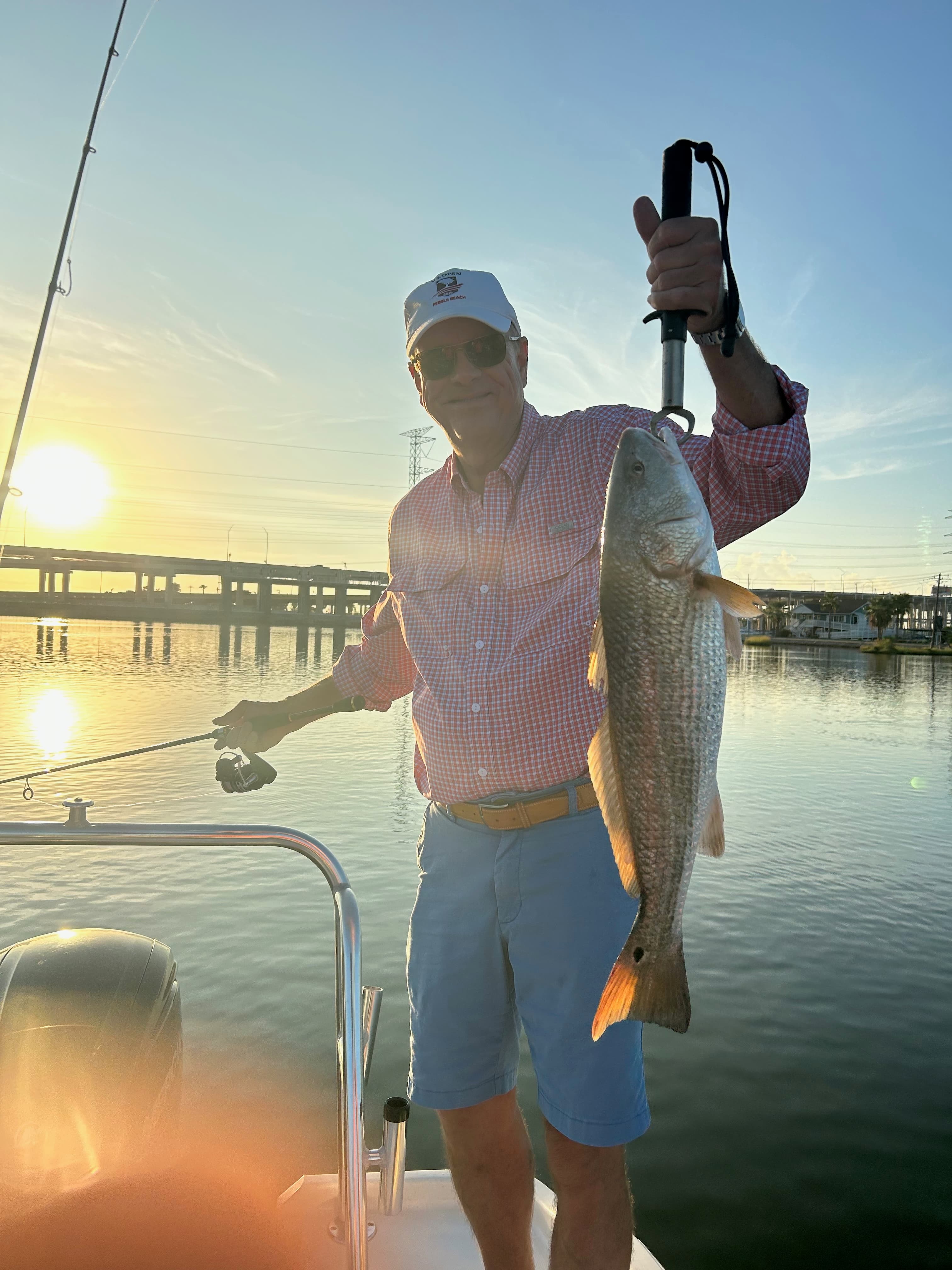 Man holding a redfish